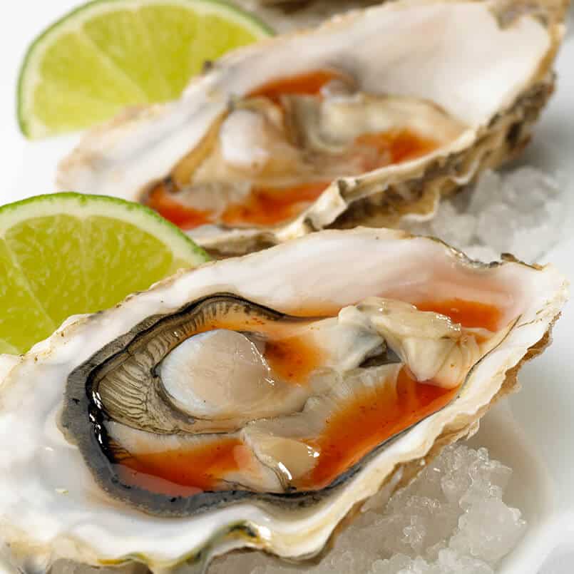Oysters with Tangy Splash-On™ Sauce