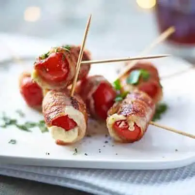 Stuffed Piquanté Peppers Wrapped with Crispy Bacon