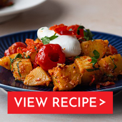 bombay potatoes with poached eggs and red piquanté peppers