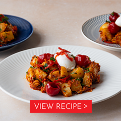 bombay potatoes with poached eggs and red piquanté peppers