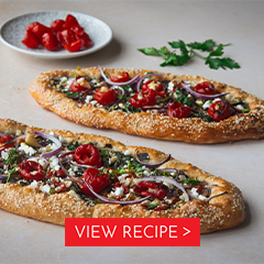 turkish pide breads with red piquanté peppers